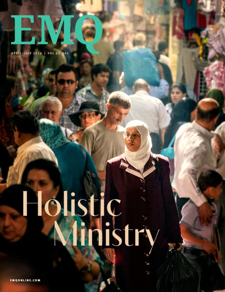 Diverse crowd at Missio Nexus event focused on holistic ministry.