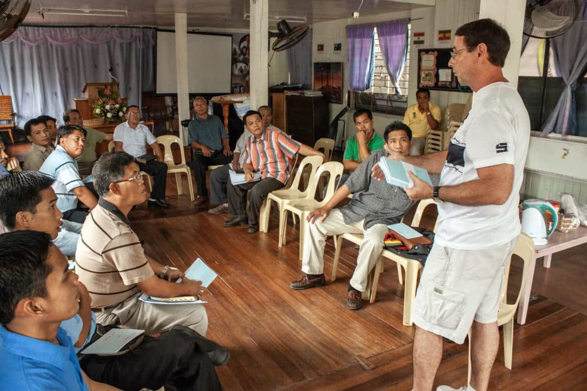 Mission Nexus training session with diverse participants in a community setting.